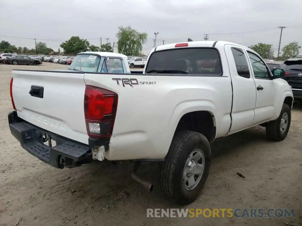 4 Photograph of a damaged car 5TFRX5GNXKX143534 TOYOTA TACOMA 2019