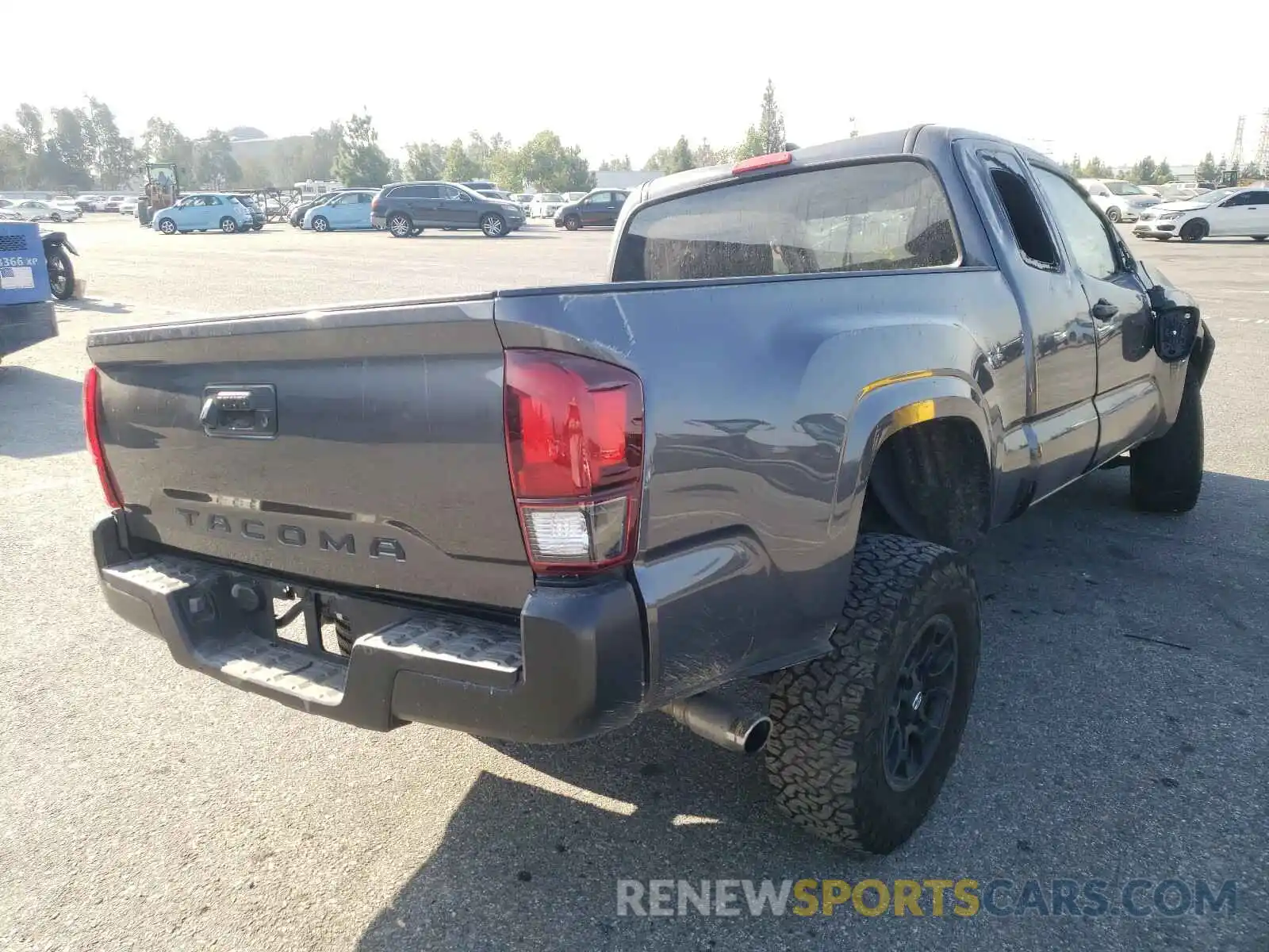 4 Photograph of a damaged car 5TFRX5GNXKX152332 TOYOTA TACOMA 2019