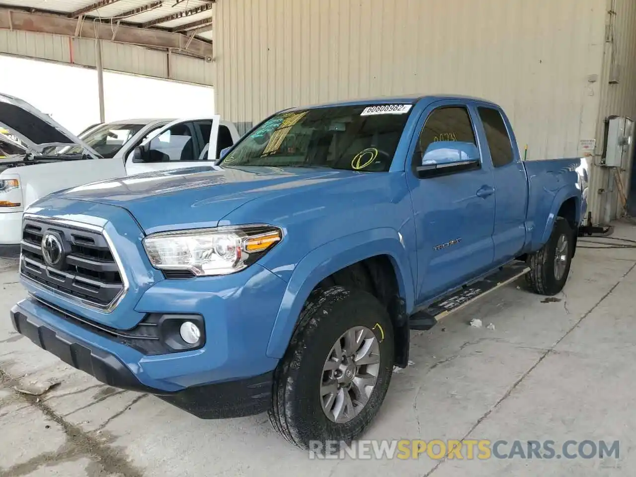 2 Photograph of a damaged car 5TFRZ5CN1KX074149 TOYOTA TACOMA 2019