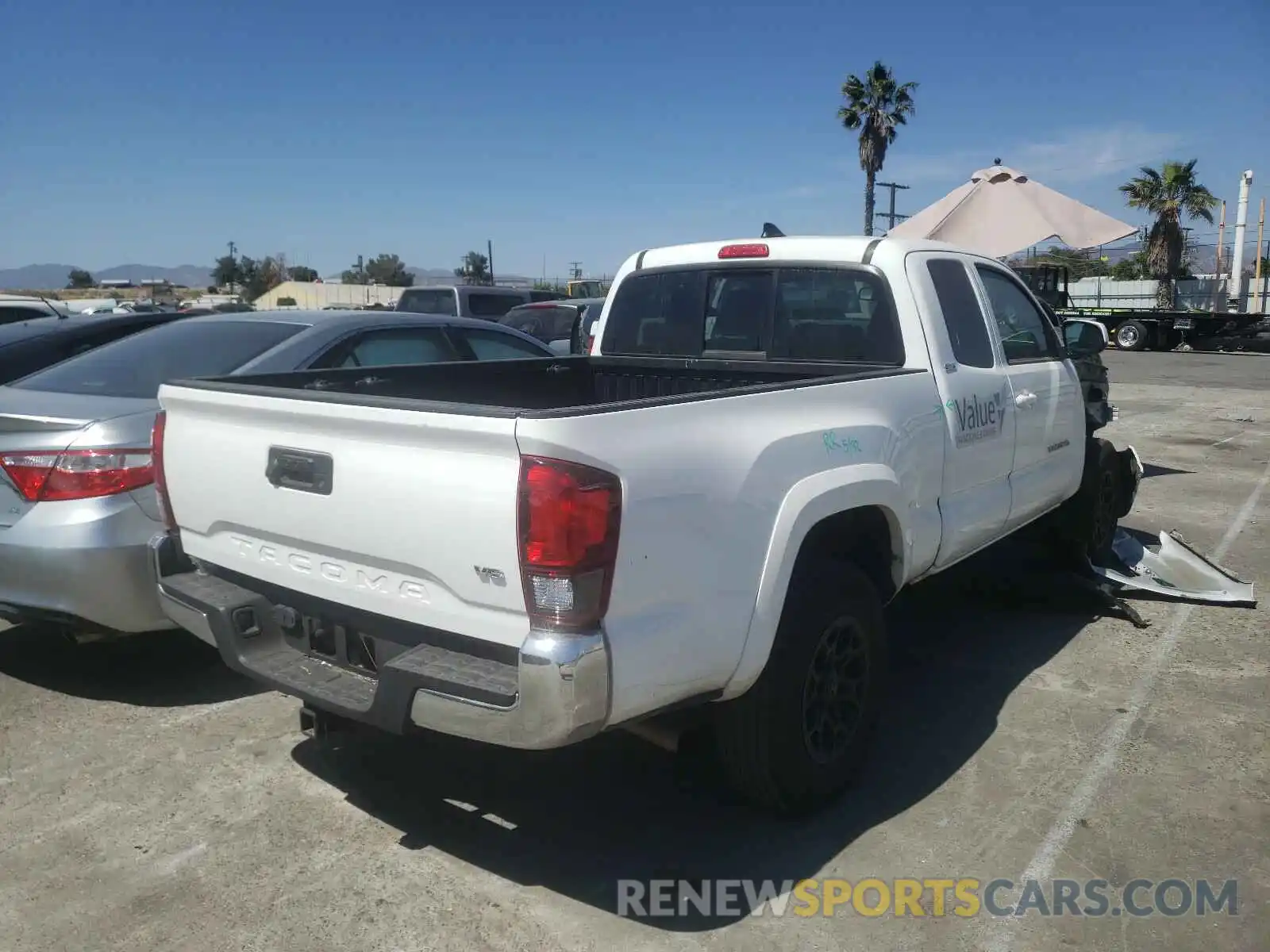 4 Photograph of a damaged car 5TFRZ5CN1KX079741 TOYOTA TACOMA 2019