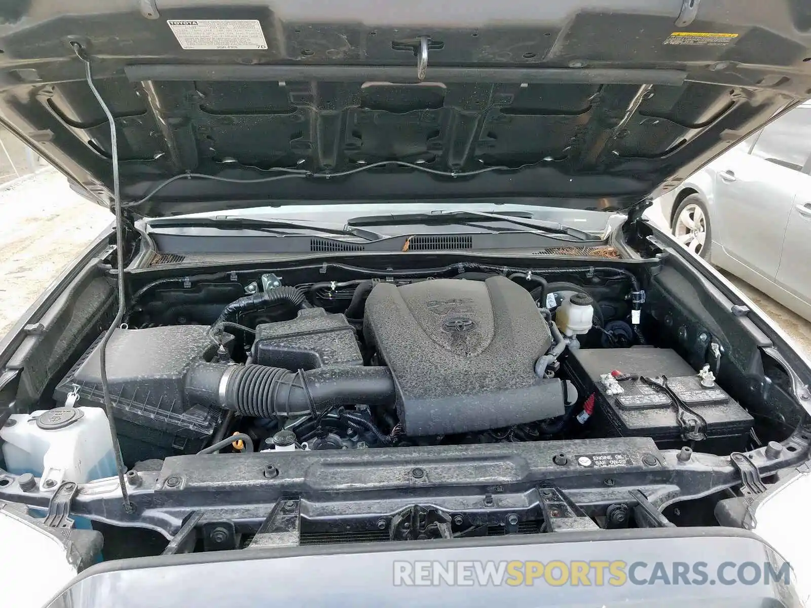 7 Photograph of a damaged car 5TFRZ5CN3KX081264 TOYOTA TACOMA 2019