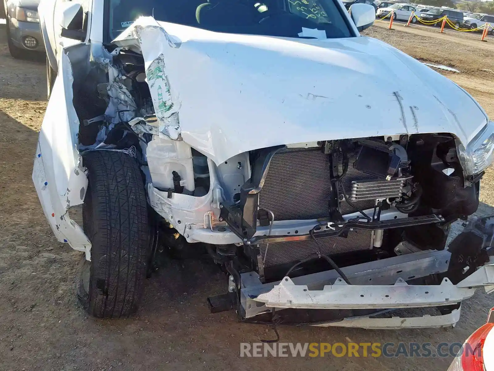 9 Photograph of a damaged car 5TFRZ5CN3KX085315 TOYOTA TACOMA 2019