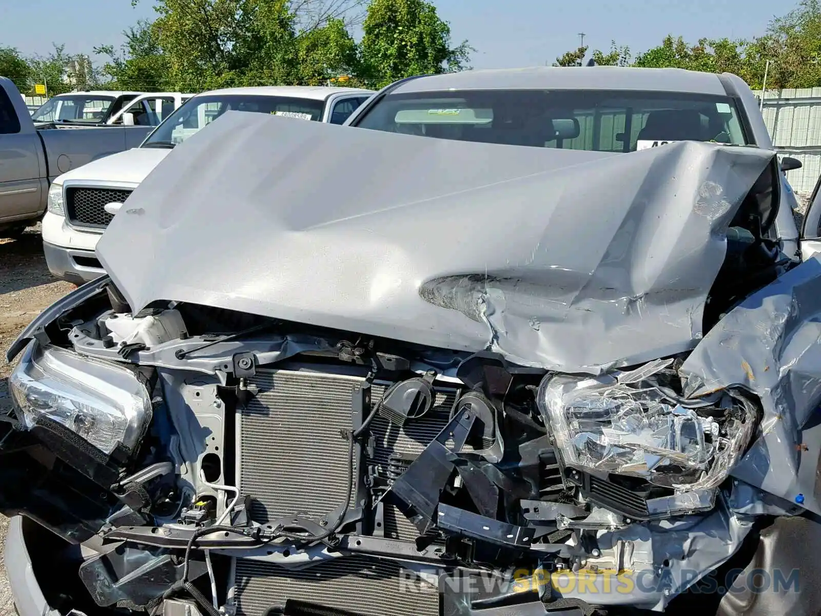 7 Photograph of a damaged car 5TFRZ5CN5KX071626 TOYOTA TACOMA 2019