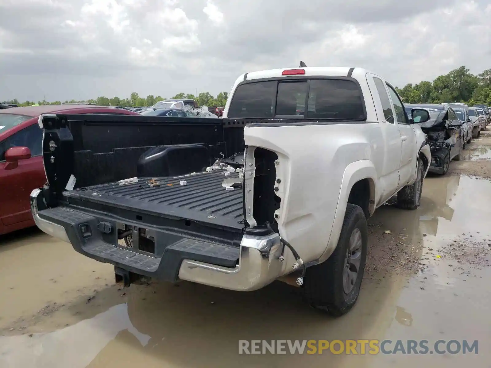 4 Photograph of a damaged car 5TFRZ5CN6KX074812 TOYOTA TACOMA 2019