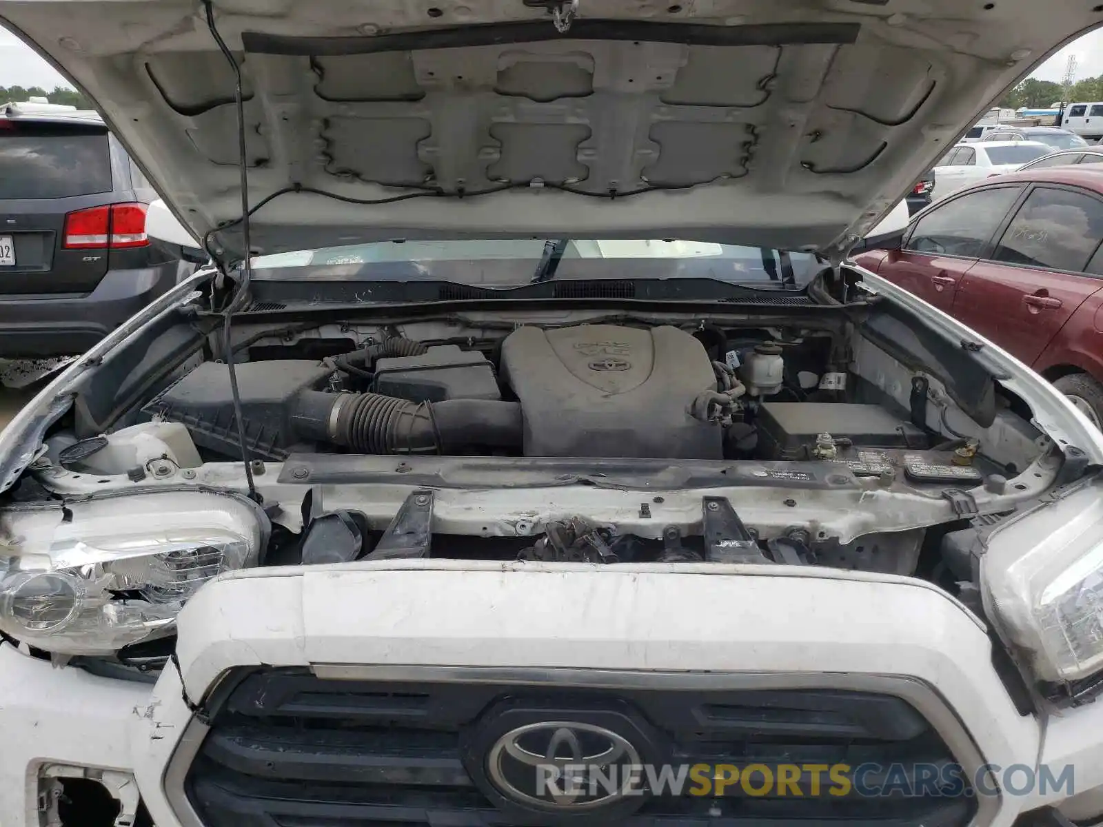 7 Photograph of a damaged car 5TFRZ5CN6KX074812 TOYOTA TACOMA 2019