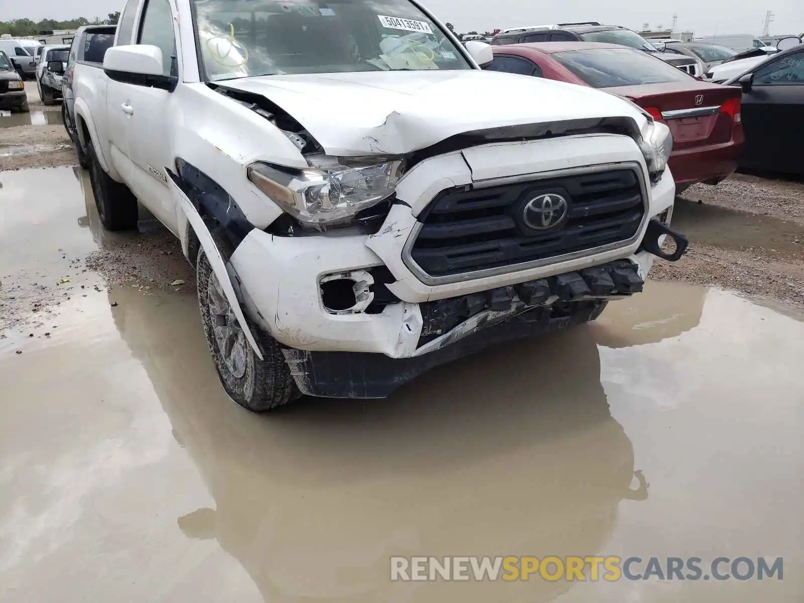 9 Photograph of a damaged car 5TFRZ5CN6KX074812 TOYOTA TACOMA 2019