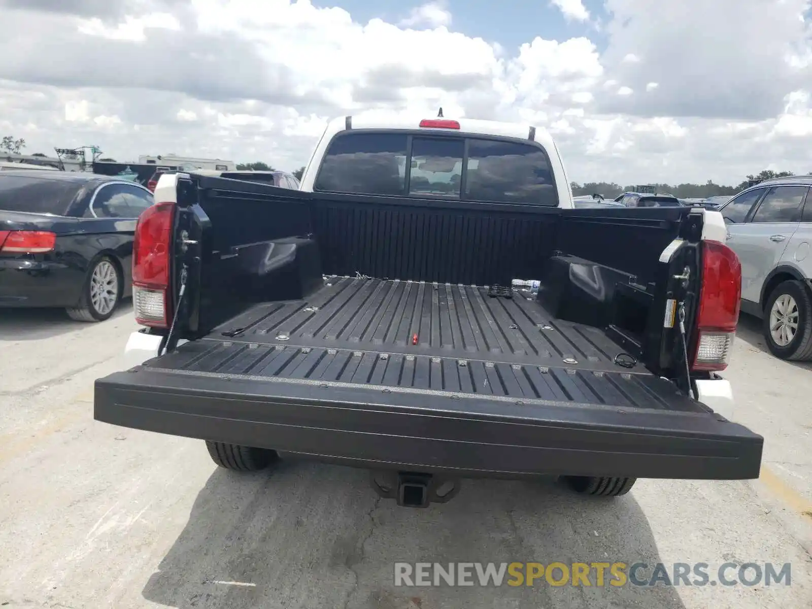 9 Photograph of a damaged car 5TFRZ5CN6KX083090 TOYOTA TACOMA 2019