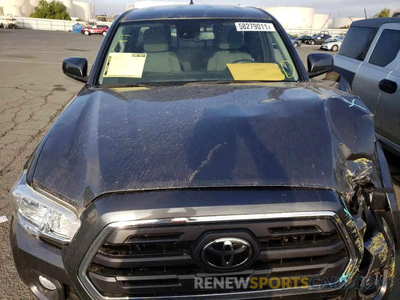 7 Photograph of a damaged car 5TFRZ5CN7KX077296 TOYOTA TACOMA 2019