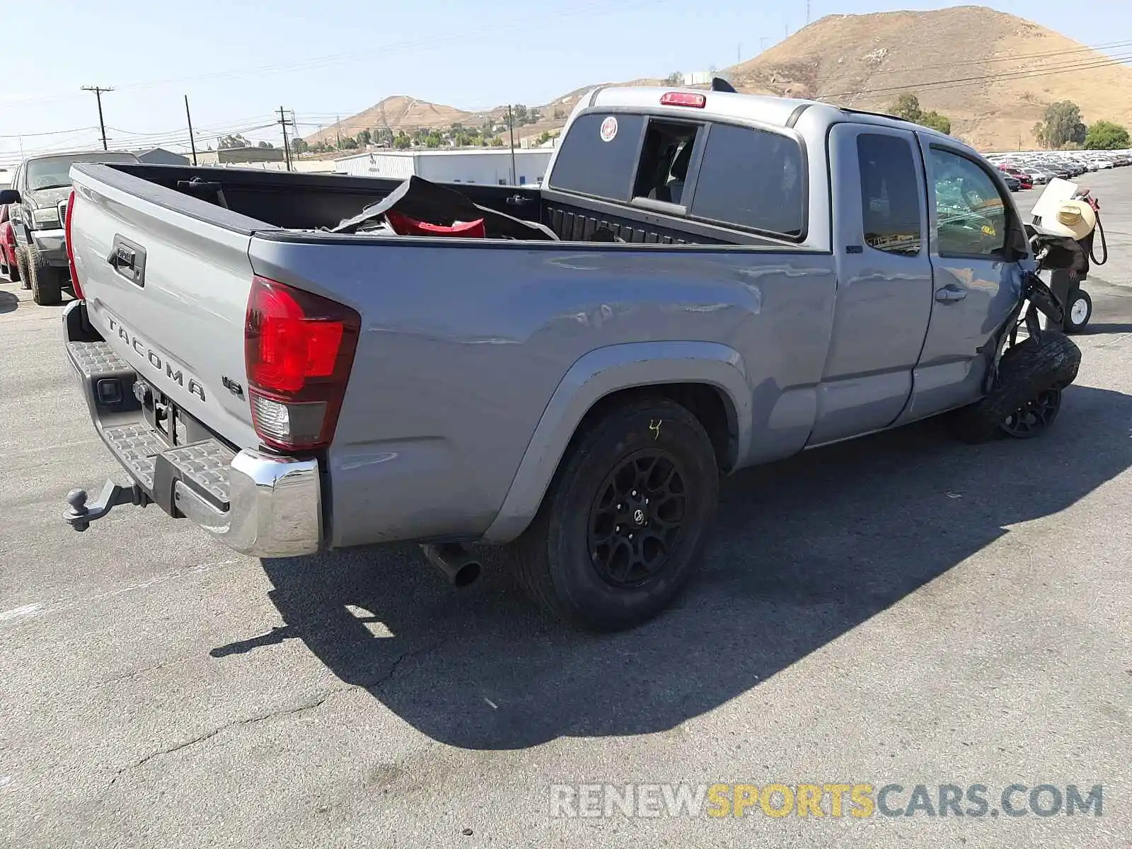 4 Photograph of a damaged car 5TFRZ5CN9KX084413 TOYOTA TACOMA 2019