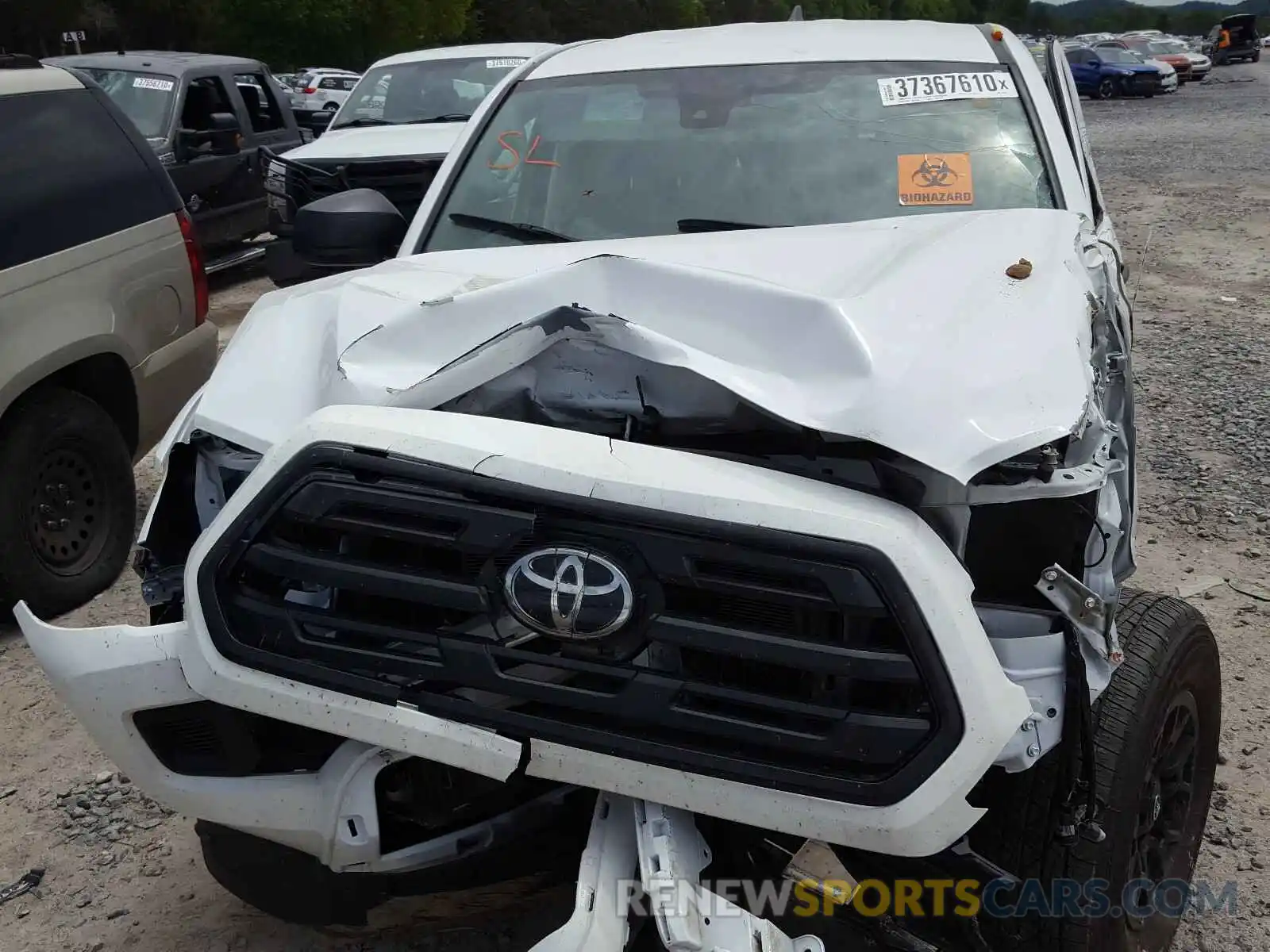 7 Photograph of a damaged car 5TFSX5EN9KX067311 TOYOTA TACOMA 2019