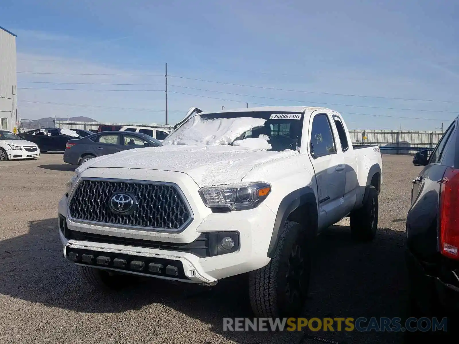 2 Photograph of a damaged car 5TFSZ5AN0KX175073 TOYOTA TACOMA 2019