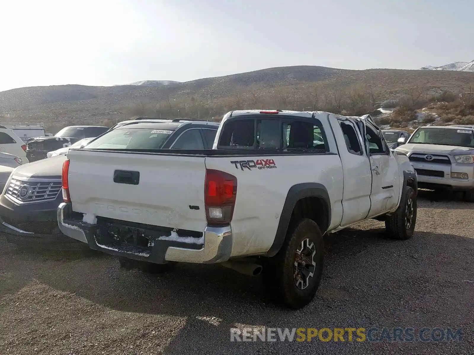 4 Photograph of a damaged car 5TFSZ5AN0KX175073 TOYOTA TACOMA 2019