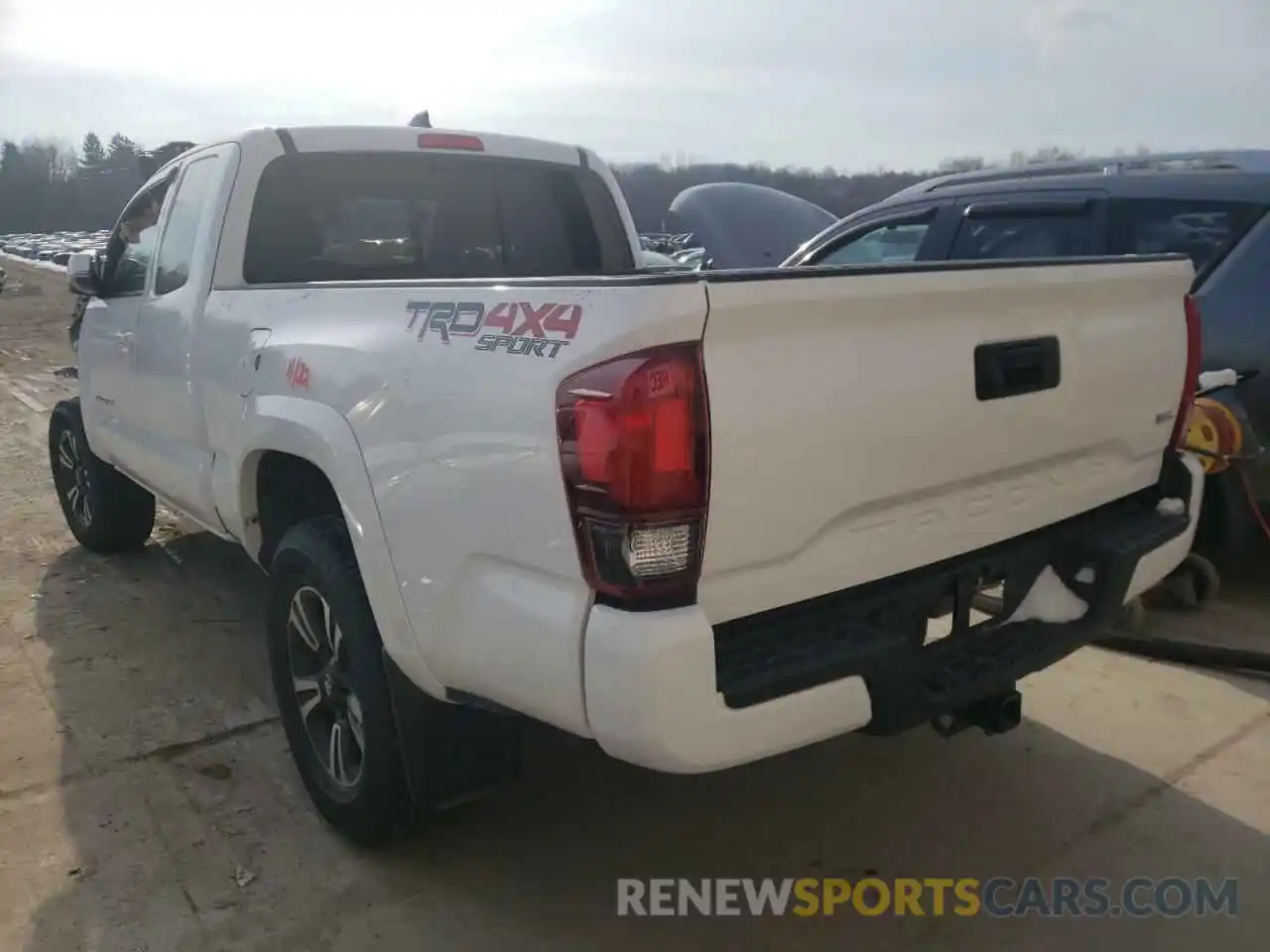 3 Photograph of a damaged car 5TFSZ5AN0KX185666 TOYOTA TACOMA 2019