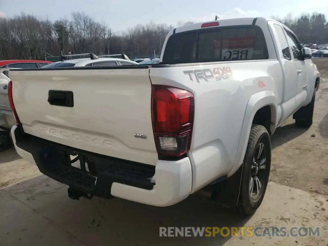 4 Photograph of a damaged car 5TFSZ5AN0KX185666 TOYOTA TACOMA 2019