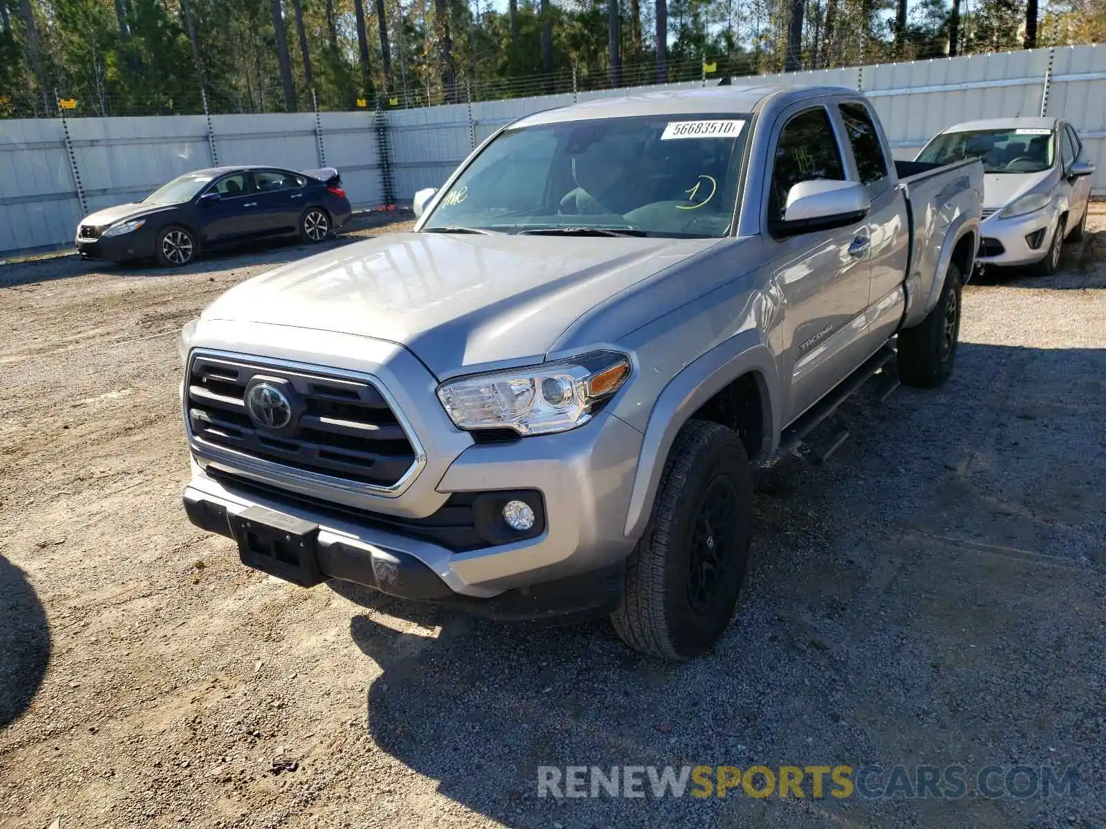 2 Photograph of a damaged car 5TFSZ5AN0KX185912 TOYOTA TACOMA 2019