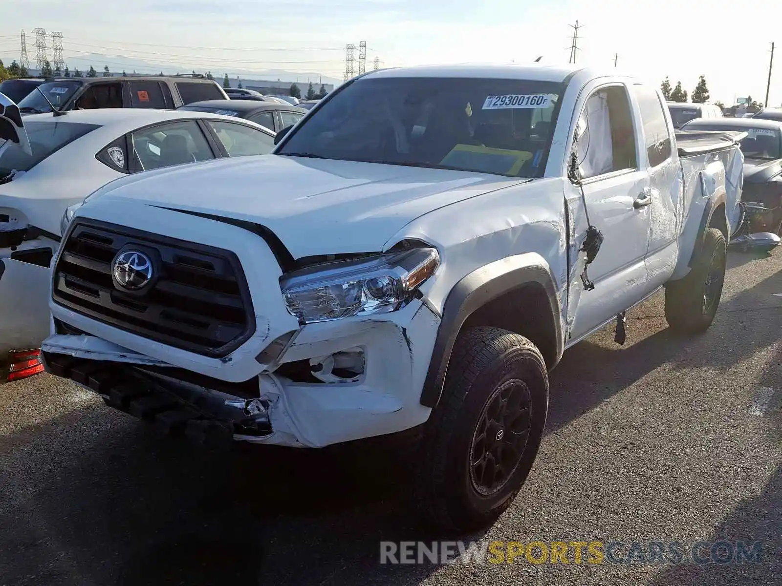 2 Photograph of a damaged car 5TFSZ5AN0KX189412 TOYOTA TACOMA 2019