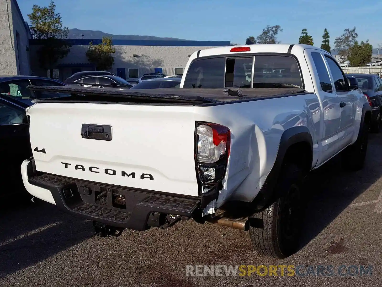 4 Photograph of a damaged car 5TFSZ5AN0KX189412 TOYOTA TACOMA 2019