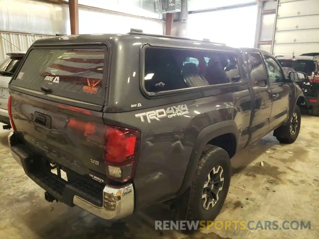 4 Photograph of a damaged car 5TFSZ5AN1KX167404 TOYOTA TACOMA 2019