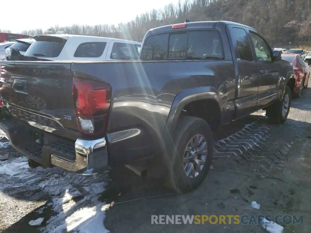 4 Photograph of a damaged car 5TFSZ5AN1KX172229 TOYOTA TACOMA 2019