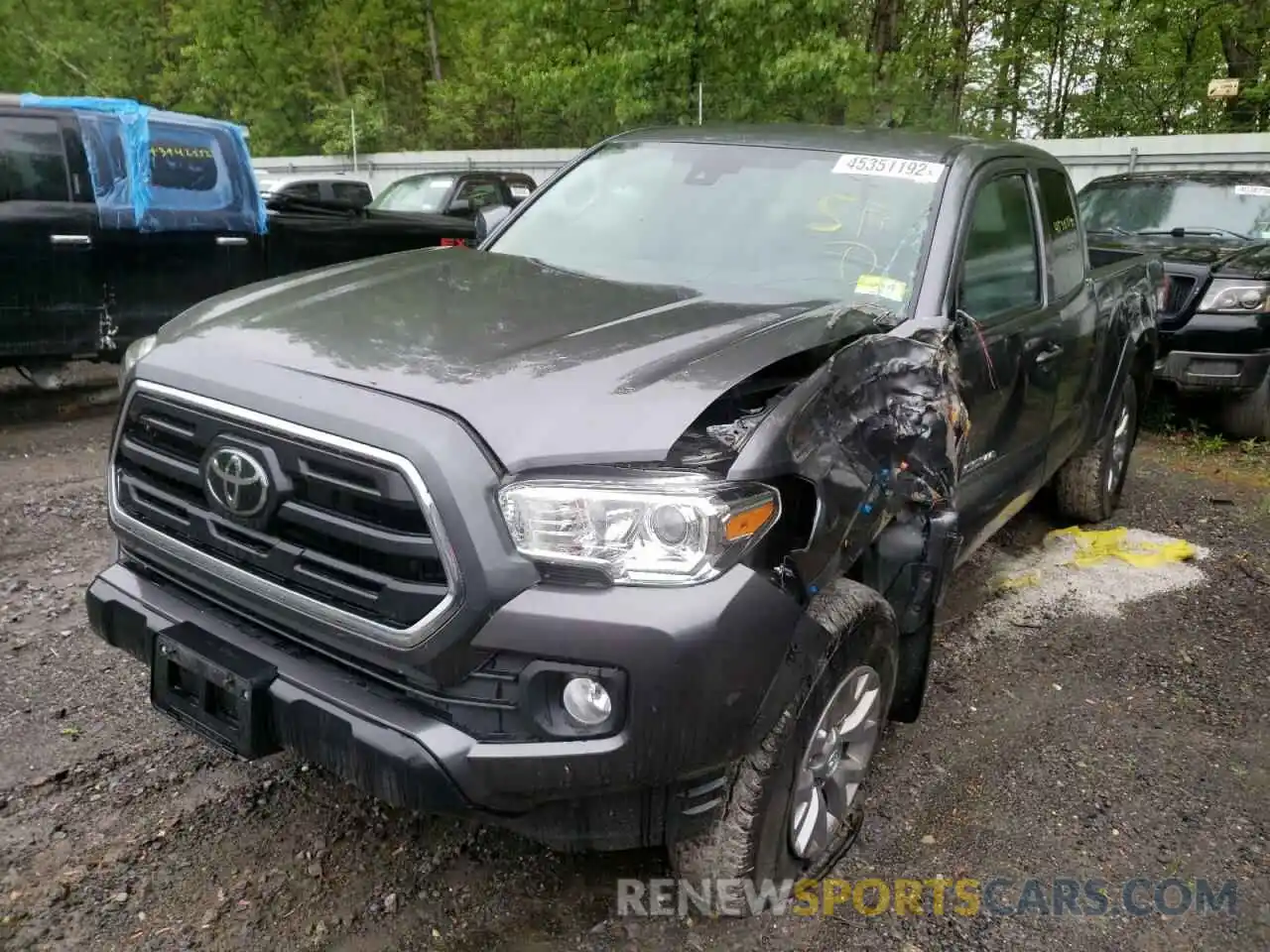 2 Photograph of a damaged car 5TFSZ5AN1KX182839 TOYOTA TACOMA 2019