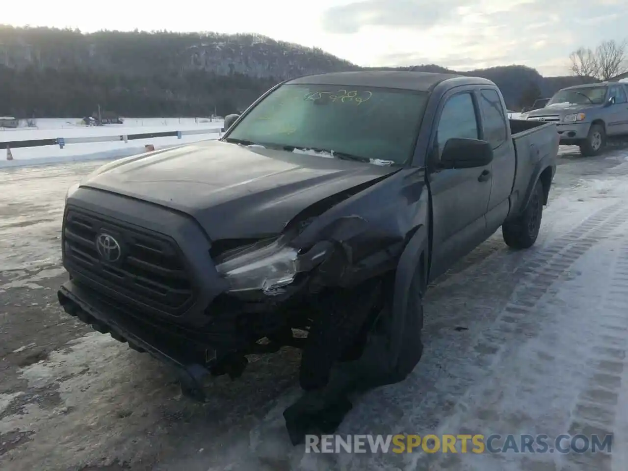 2 Photograph of a damaged car 5TFSZ5AN1KX205794 TOYOTA TACOMA 2019