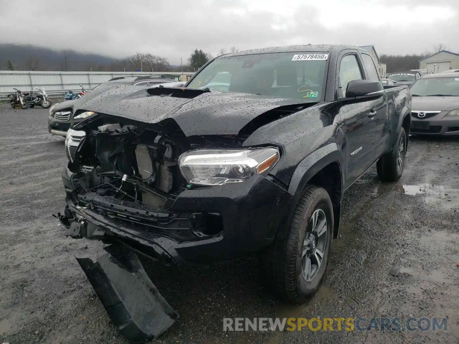 2 Photograph of a damaged car 5TFSZ5AN1KX206492 TOYOTA TACOMA 2019