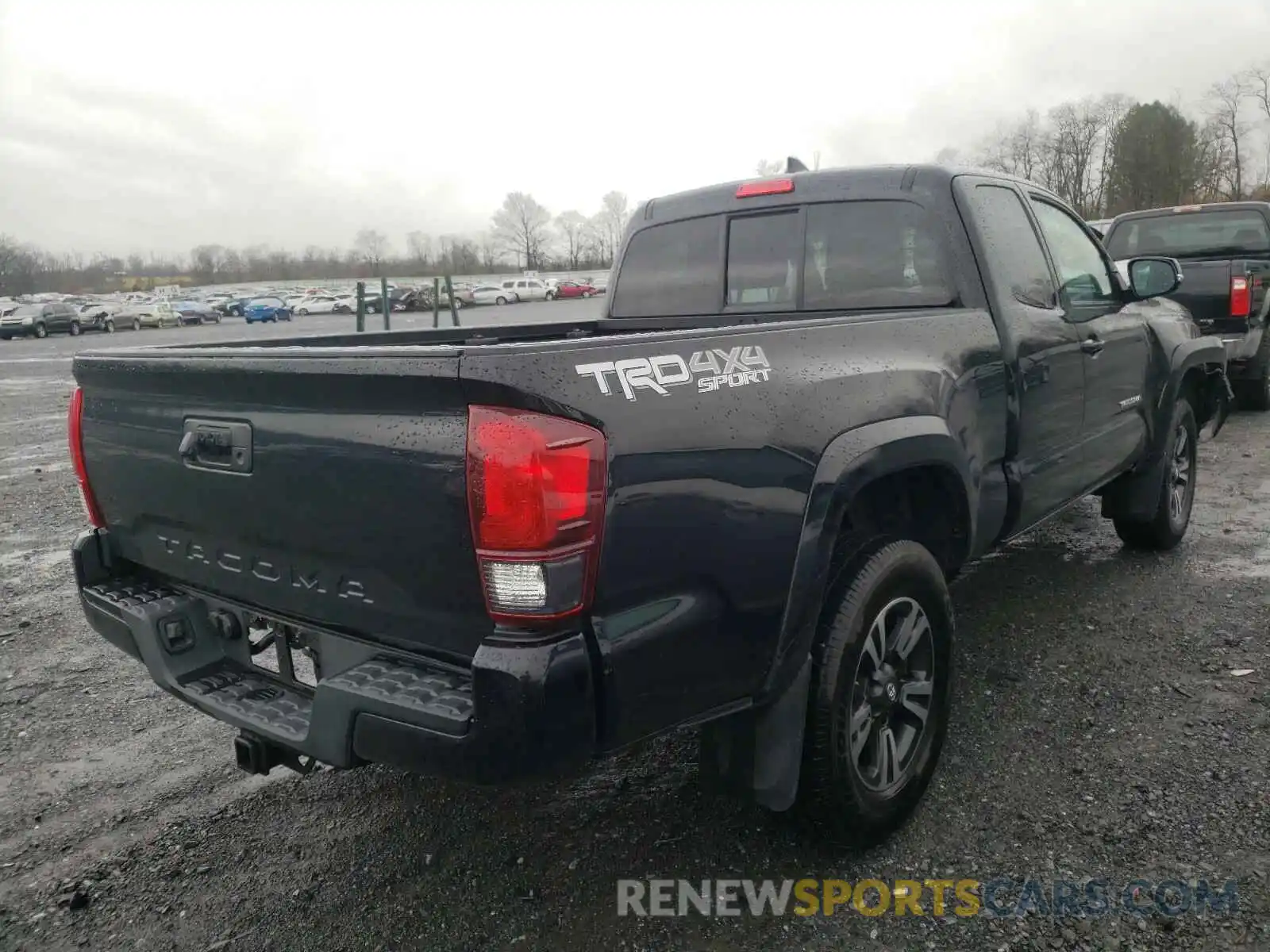 4 Photograph of a damaged car 5TFSZ5AN1KX206492 TOYOTA TACOMA 2019