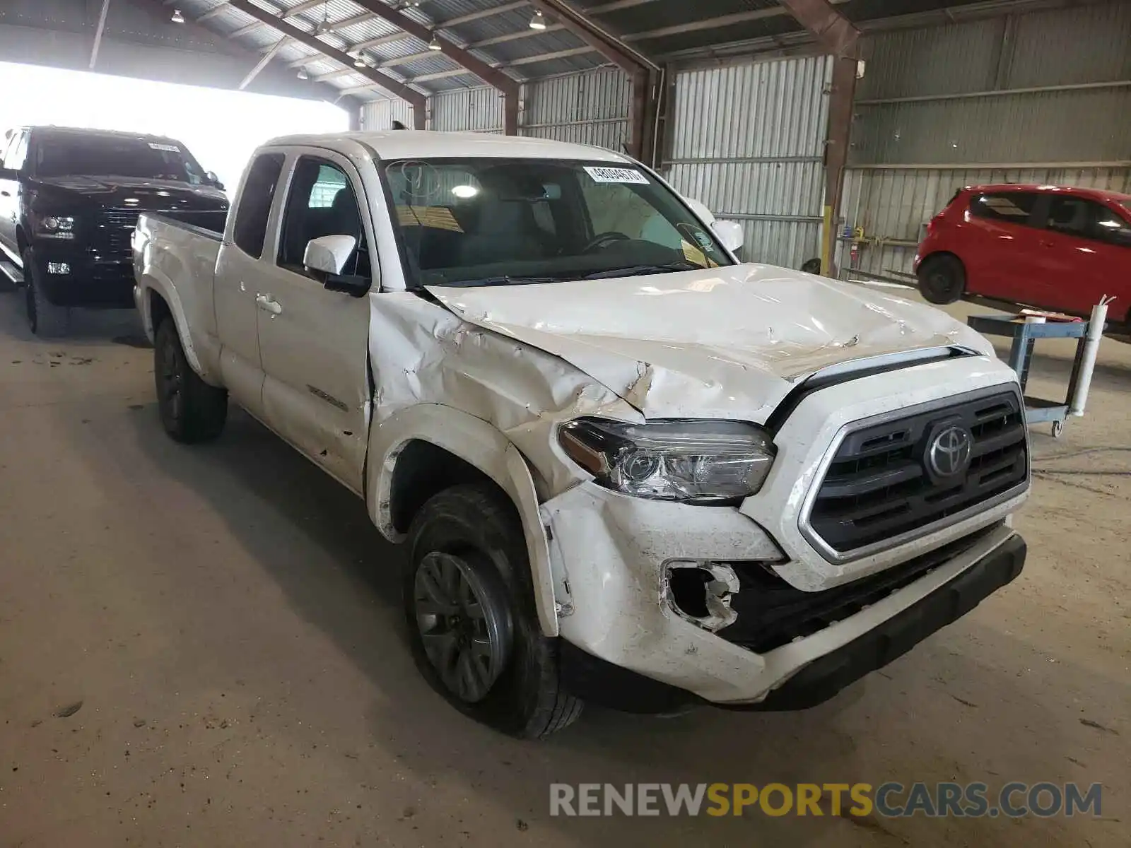 1 Photograph of a damaged car 5TFSZ5AN2KX174295 TOYOTA TACOMA 2019