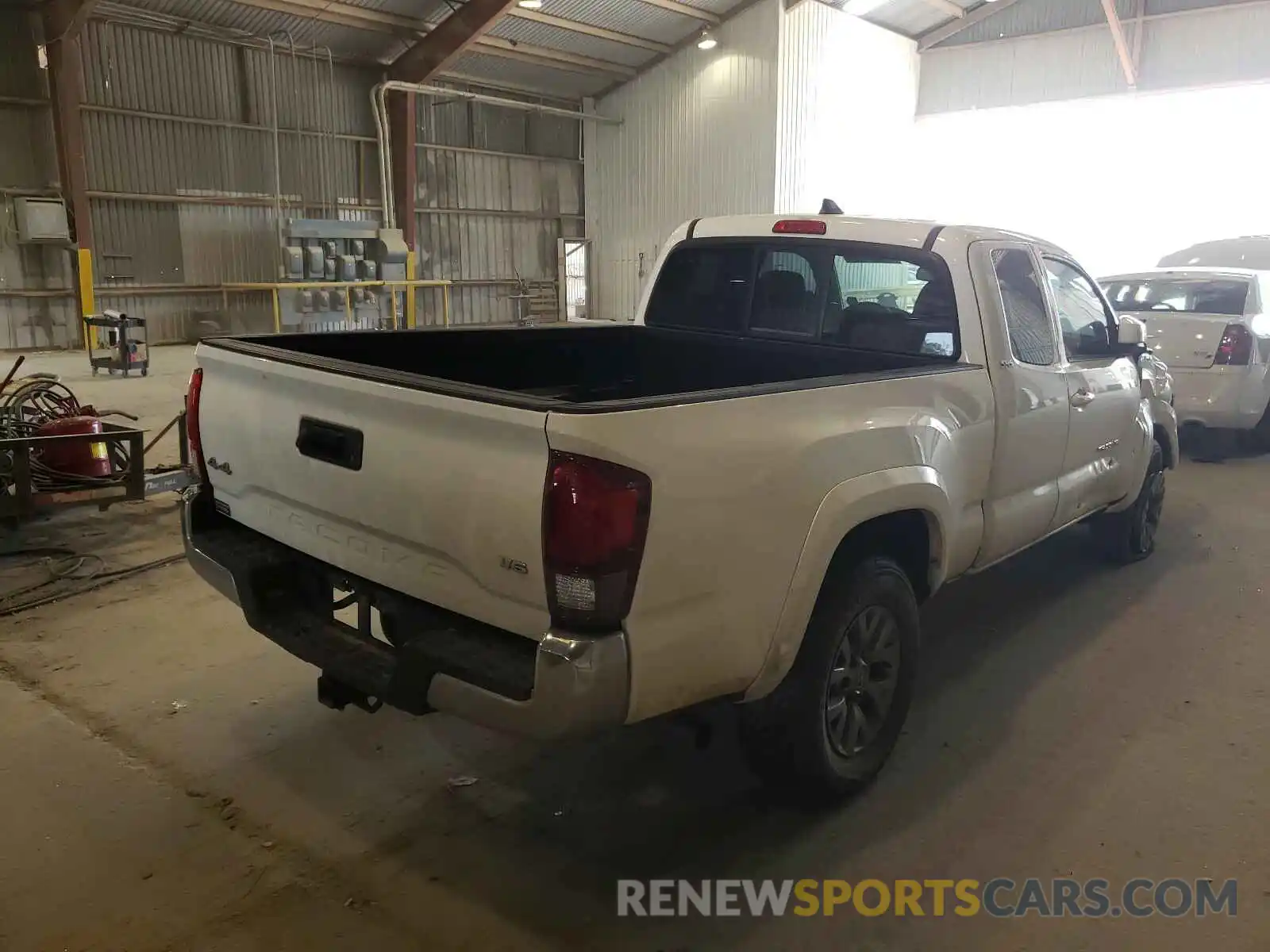 4 Photograph of a damaged car 5TFSZ5AN2KX174295 TOYOTA TACOMA 2019