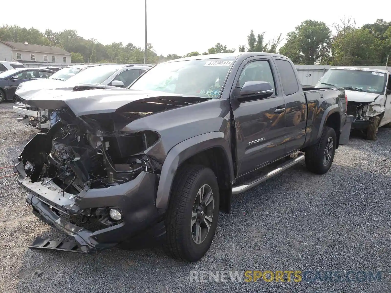 2 Photograph of a damaged car 5TFSZ5AN2KX186589 TOYOTA TACOMA 2019