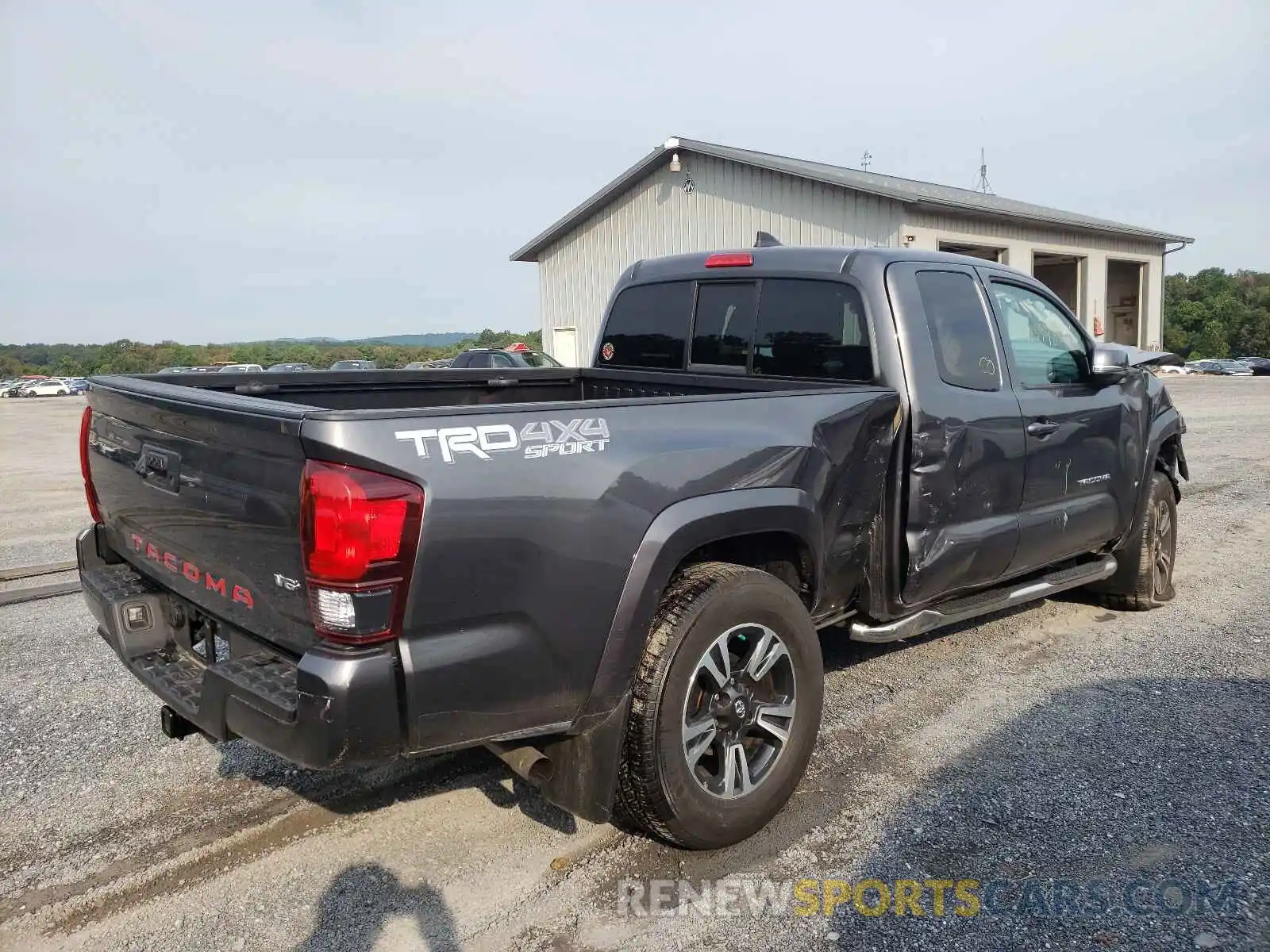 4 Photograph of a damaged car 5TFSZ5AN2KX186589 TOYOTA TACOMA 2019