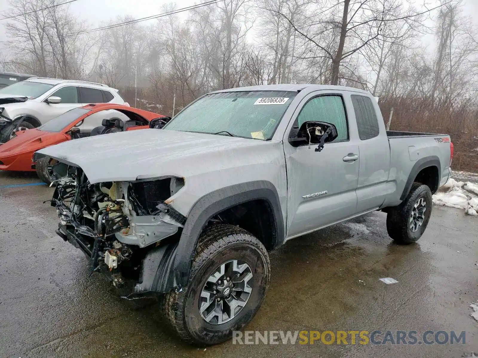 2 Photograph of a damaged car 5TFSZ5AN2KX187662 TOYOTA TACOMA 2019