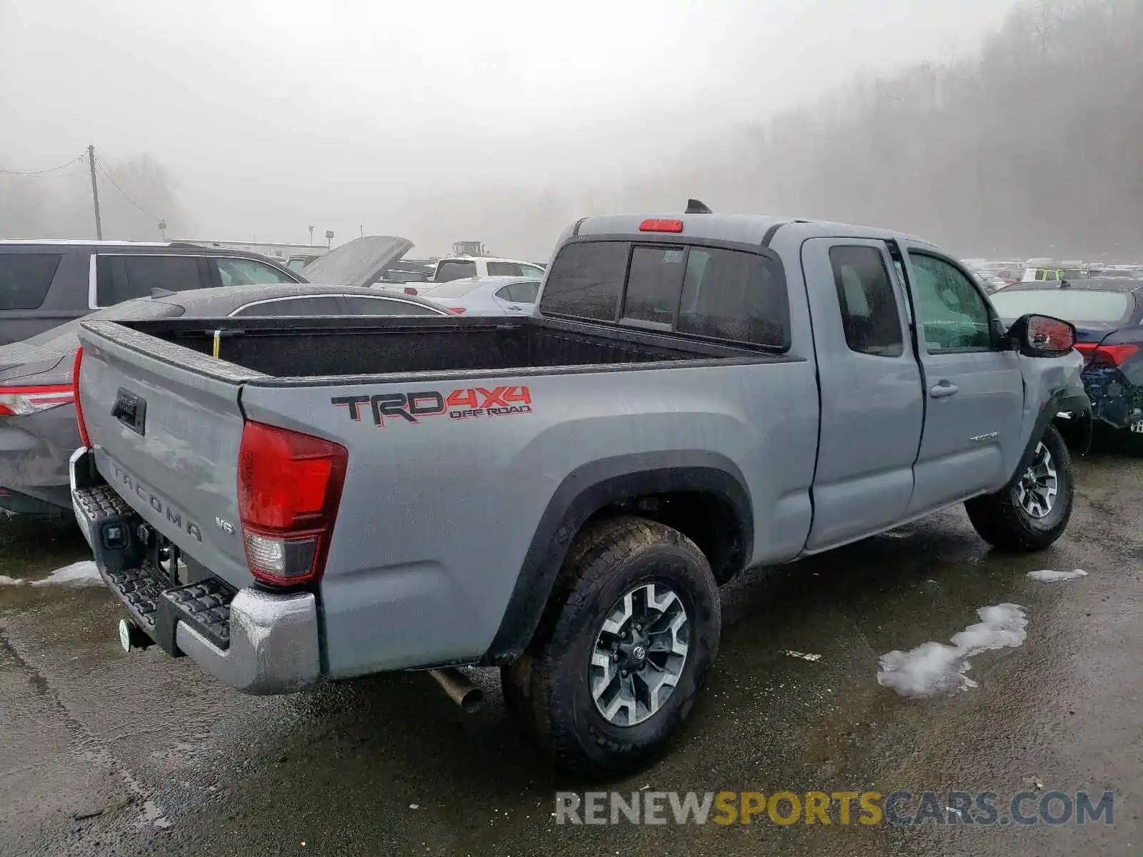 4 Photograph of a damaged car 5TFSZ5AN2KX187662 TOYOTA TACOMA 2019