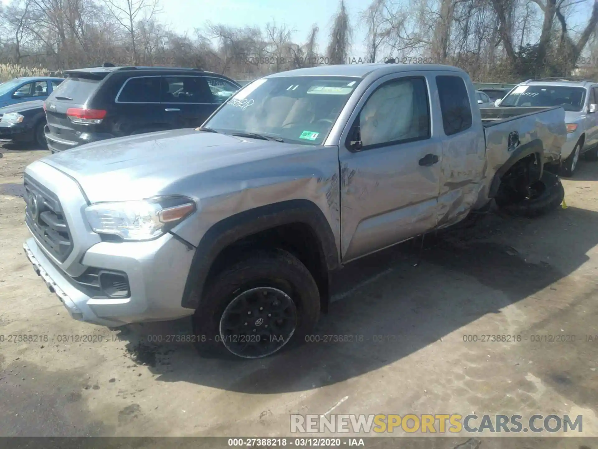 2 Photograph of a damaged car 5TFSZ5AN2KX196443 TOYOTA TACOMA 2019