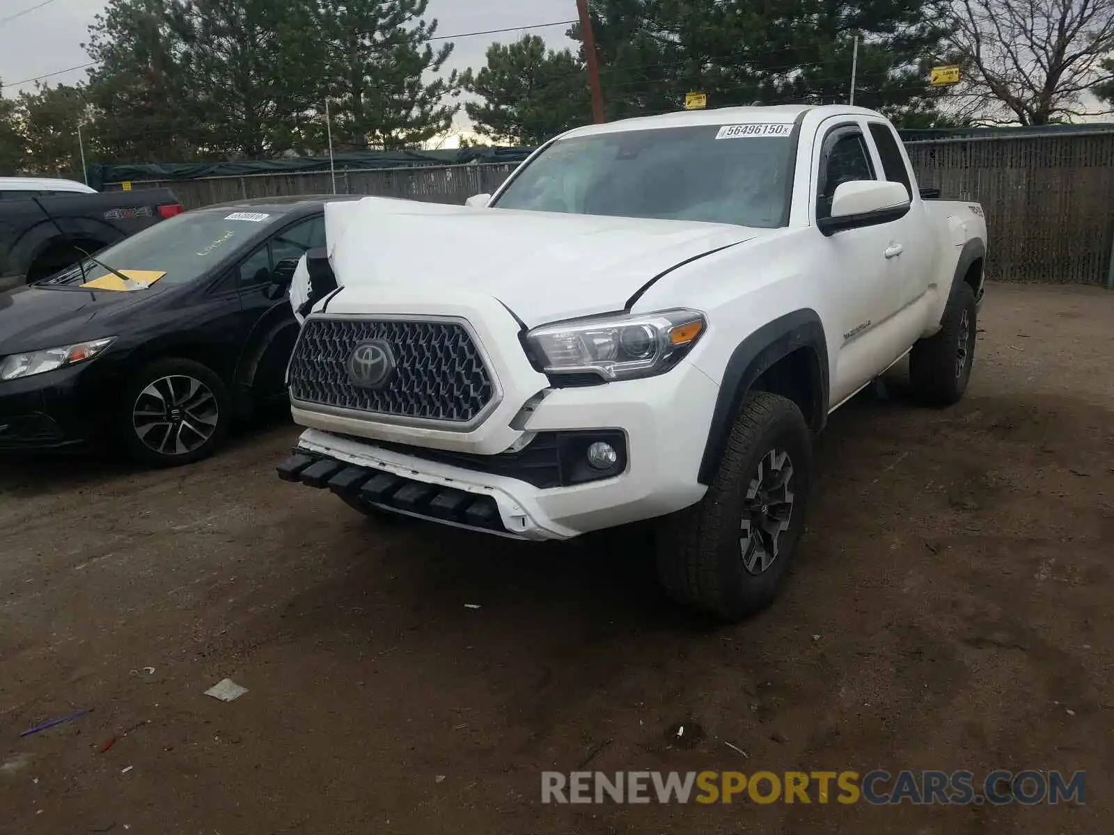 2 Photograph of a damaged car 5TFSZ5AN2KX201219 TOYOTA TACOMA 2019