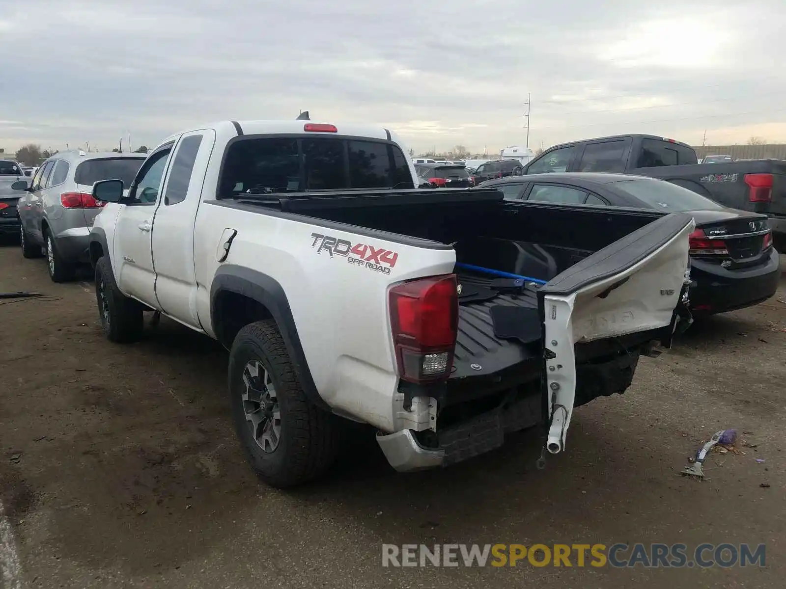 3 Photograph of a damaged car 5TFSZ5AN2KX201219 TOYOTA TACOMA 2019