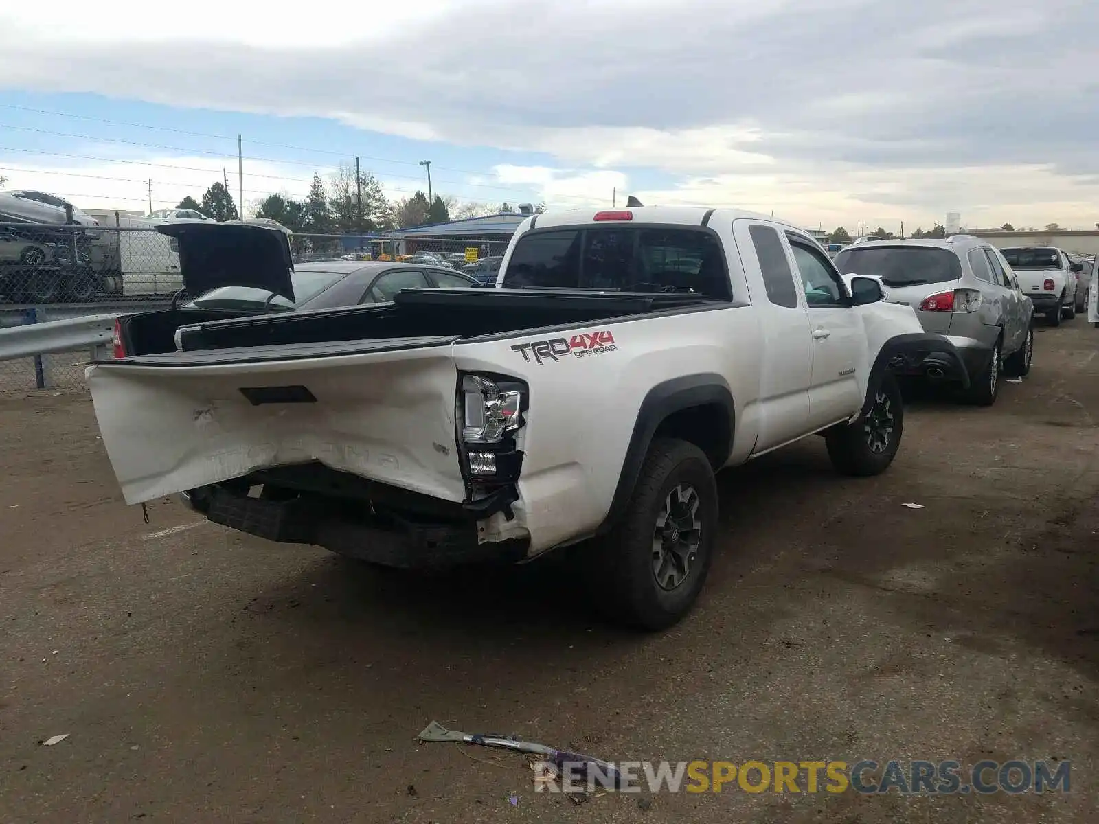 4 Photograph of a damaged car 5TFSZ5AN2KX201219 TOYOTA TACOMA 2019