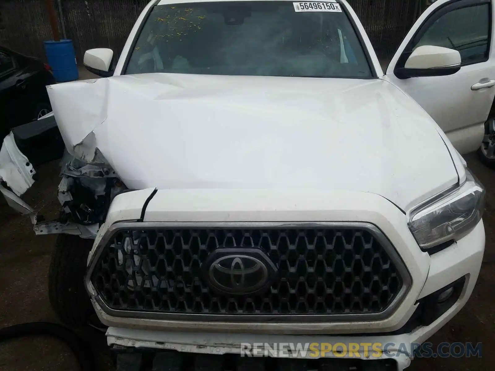 7 Photograph of a damaged car 5TFSZ5AN2KX201219 TOYOTA TACOMA 2019