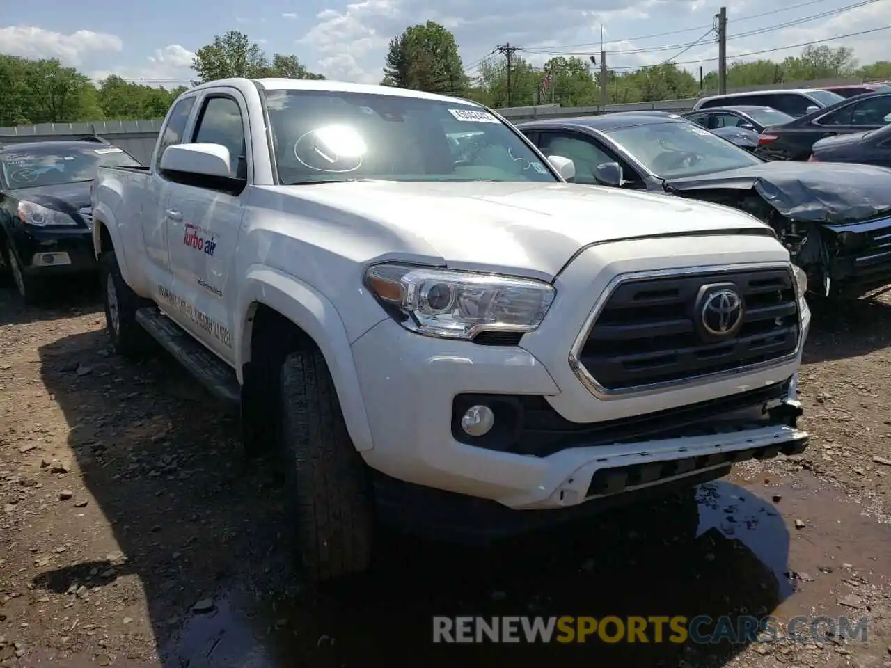 1 Photograph of a damaged car 5TFSZ5AN2KX202709 TOYOTA TACOMA 2019