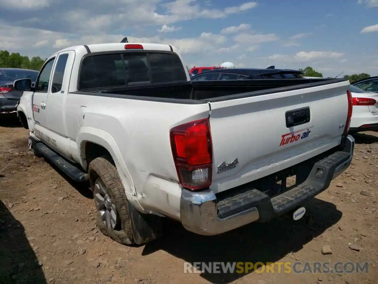 3 Photograph of a damaged car 5TFSZ5AN2KX202709 TOYOTA TACOMA 2019