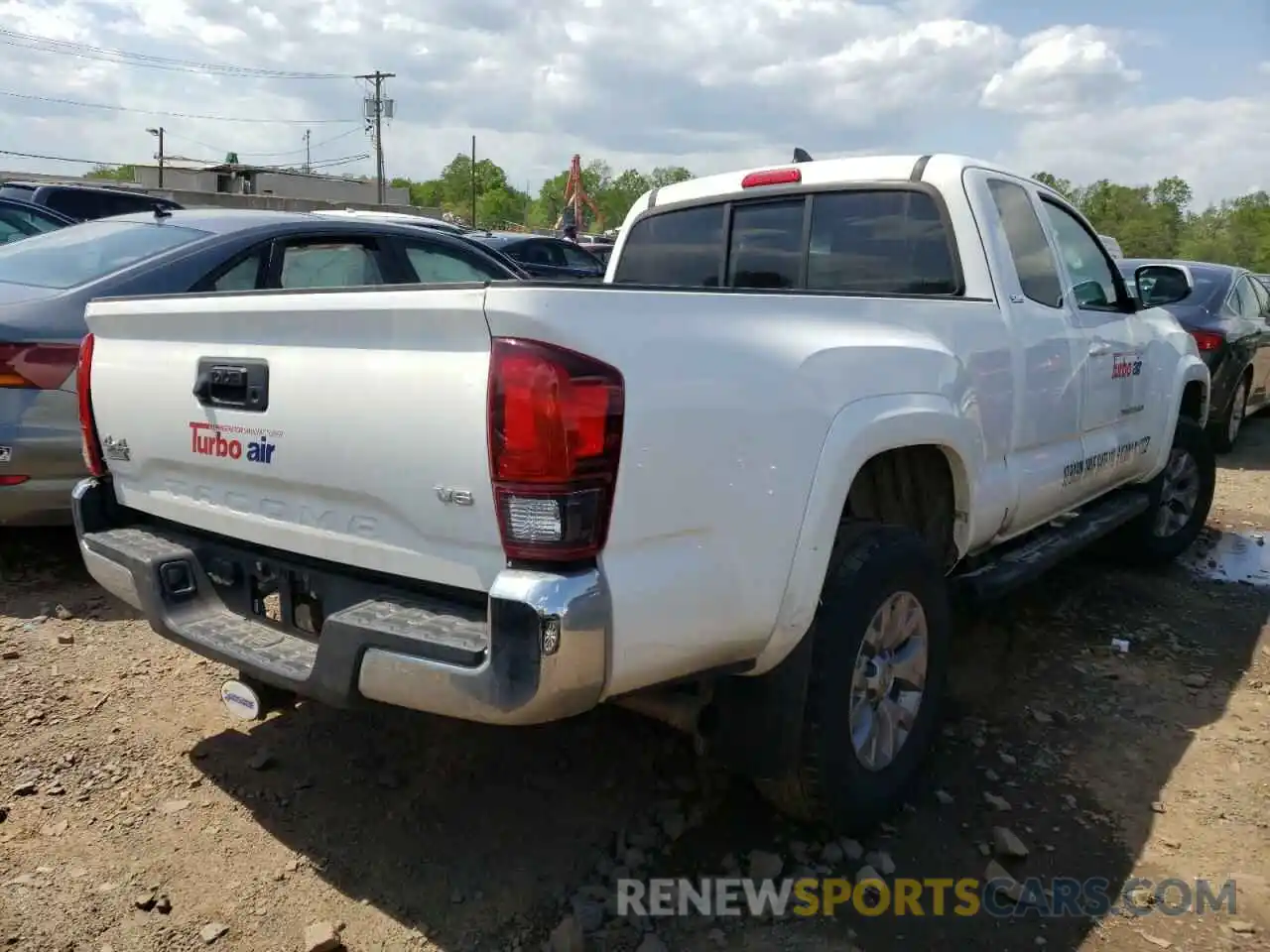 4 Photograph of a damaged car 5TFSZ5AN2KX202709 TOYOTA TACOMA 2019