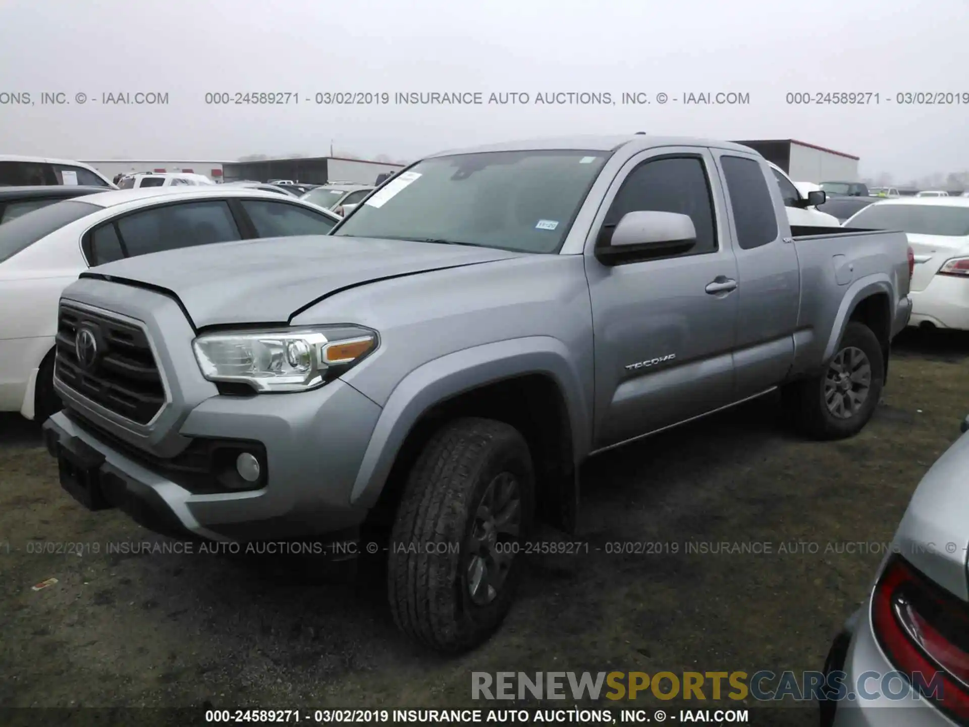 2 Photograph of a damaged car 5TFSZ5AN3KX169137 TOYOTA TACOMA 2019