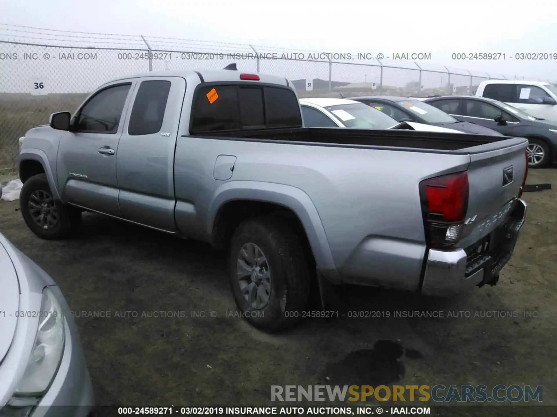 3 Photograph of a damaged car 5TFSZ5AN3KX169137 TOYOTA TACOMA 2019