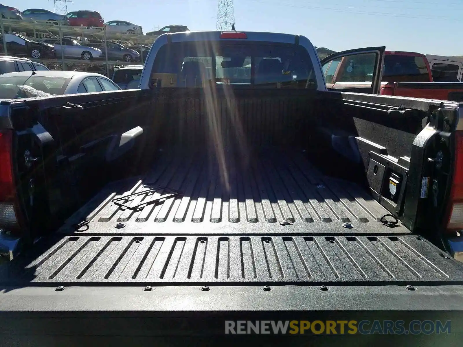 6 Photograph of a damaged car 5TFSZ5AN3KX173219 TOYOTA TACOMA 2019