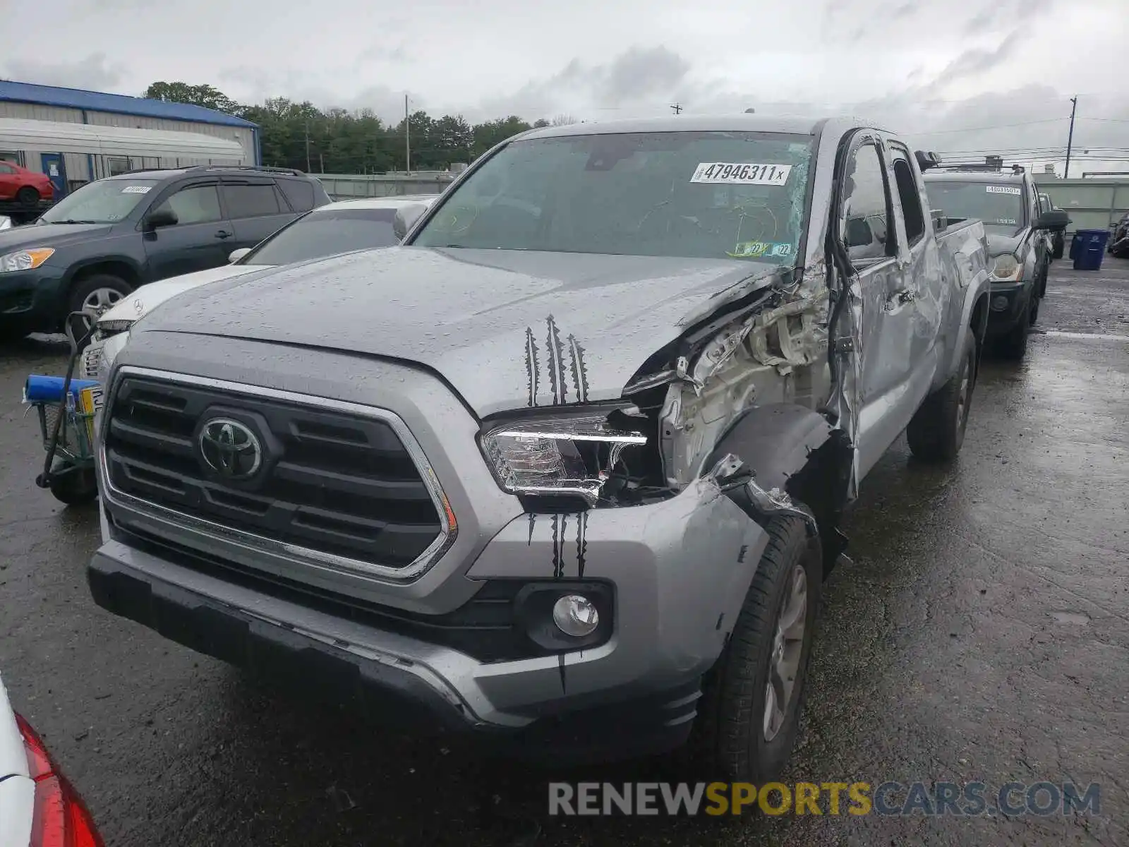 2 Photograph of a damaged car 5TFSZ5AN3KX179845 TOYOTA TACOMA 2019