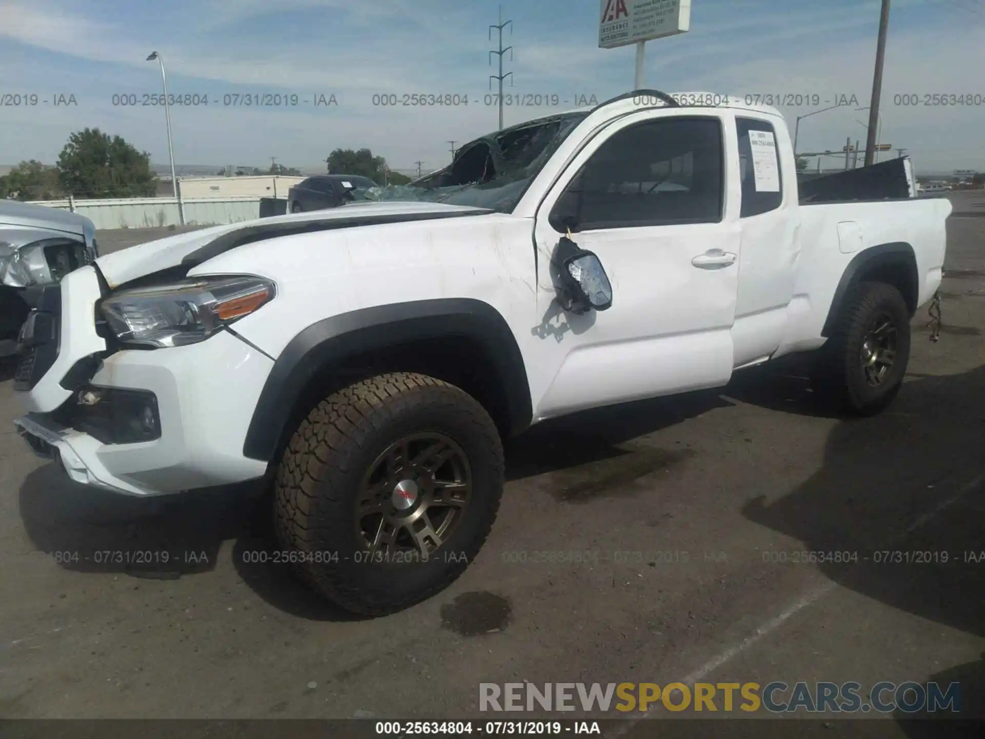 2 Photograph of a damaged car 5TFSZ5AN3KX185192 TOYOTA TACOMA 2019