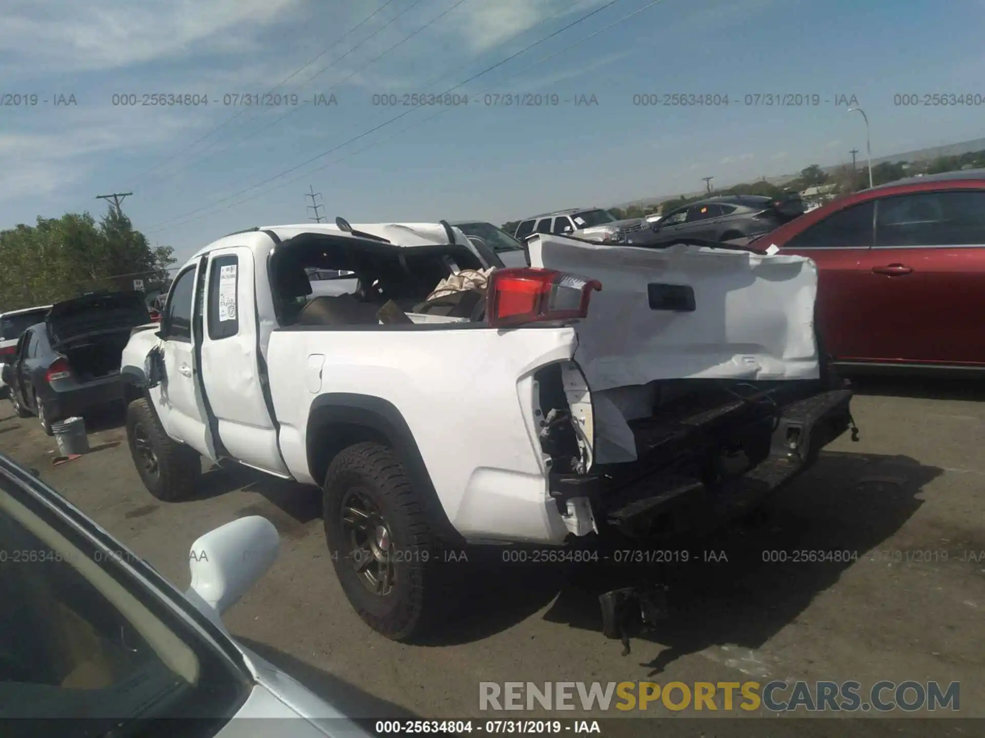 3 Photograph of a damaged car 5TFSZ5AN3KX185192 TOYOTA TACOMA 2019