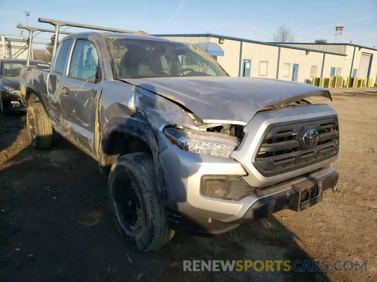 1 Photograph of a damaged car 5TFSZ5AN4KX165615 TOYOTA TACOMA 2019