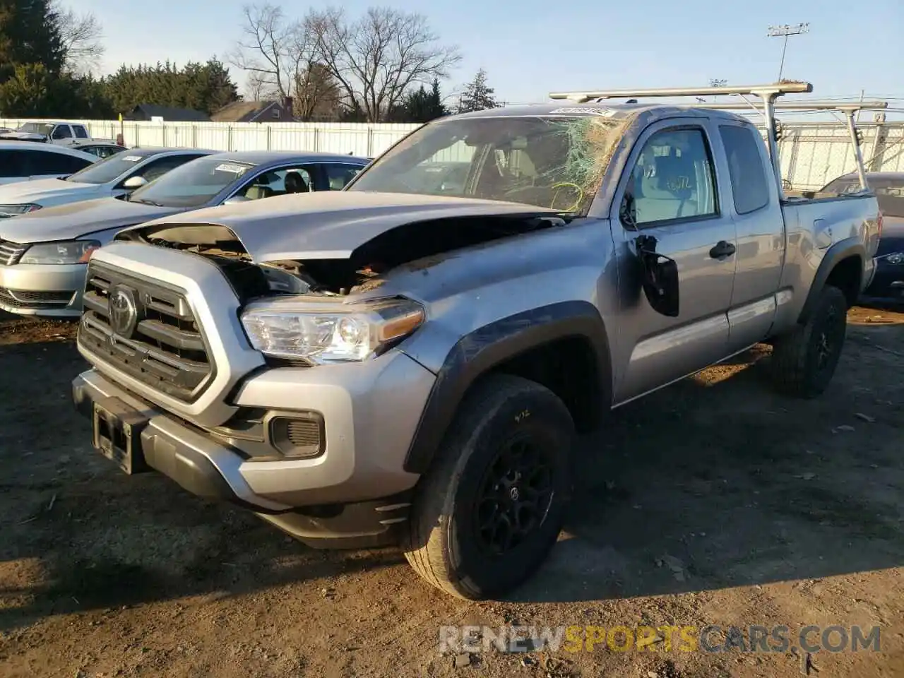 2 Photograph of a damaged car 5TFSZ5AN4KX165615 TOYOTA TACOMA 2019