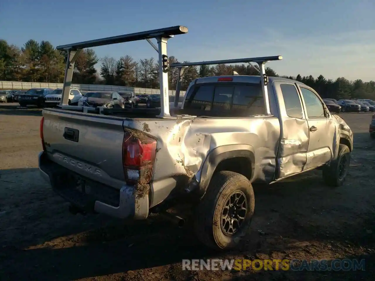 4 Photograph of a damaged car 5TFSZ5AN4KX165615 TOYOTA TACOMA 2019